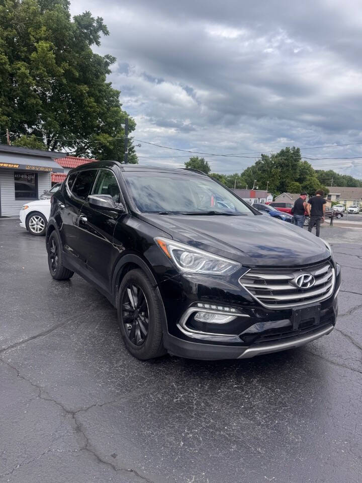 hyundai santa fe 2017 5XYZUDLA8HG501537 image hyundai santa fe 2017 5XYZUDLA8HG501537 image